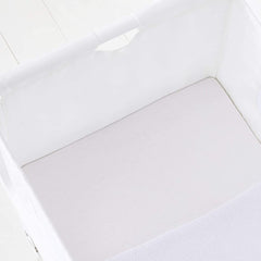 Snuz Crib Fitted Sheets (White) - lifestyle image (crib and blanket not included)