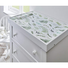 East Coast Changing Mat (Botanical) - lifestyle image, showing the mat being used with a changing unit (furniture not included)