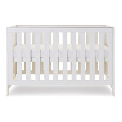 Obaby Nika Cot Bed (White Wash) - showing the cot with the mattress base at its highest level (mattress not included, available separately)