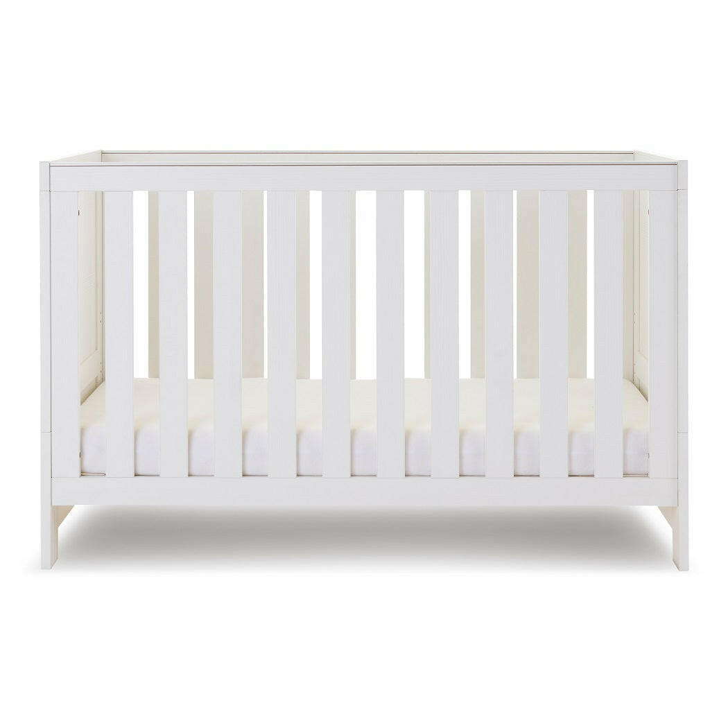 Obaby Nika Cot Bed (White Wash) - showing the cot with the mattress base at its lowest level (mattress not included, available separately)