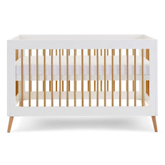 Obaby MAYA Cot Bed (White with Natural) - showing the cot with the mattress base at its highest level (mattress not included, available separately)