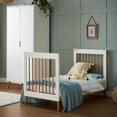 Obaby MAYA Cot Bed (White with Natural) - lifestyle image, shown here as the junior bed (mattress, bedding and toys not included)