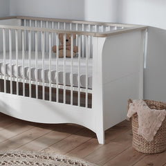CuddleCo Clara Cot Bed (White & Ash) - lifestyle image (mattress not included, available separately)
