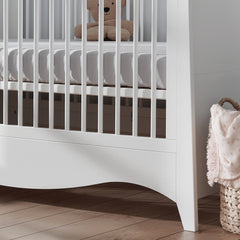 CuddleCo Clara Cot Bed (White) - lifestyle image, showing a close-up image of the cot bed (mattress and soft toy not included)