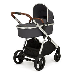 Ickle Bubba Eclipse Travel System with Galaxy Car Seat & ISOFIX Base (Chrome/Graphite/Tan) - showing the carrycot and chassis together as the pram with its tan leatherette handle and bumper bar