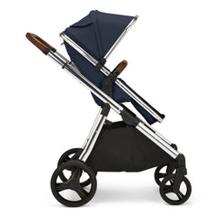 Ickle Bubba ECLIPSE Travel System with Galaxy Car Seat & ISOFIX Base (Chrome/Midnight Blue/Tan) - showing a side view of the forward-facing pushchair with seat upright
