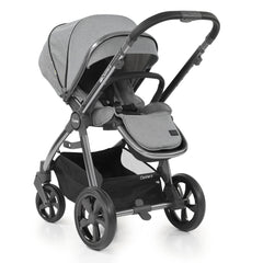 BabyStyle Oyster 3 Gunmetal ESSENTIAL Bundle (Moon) - quarter view, showing the seat unit and chassis together as the pushchair in parent-facing mode
