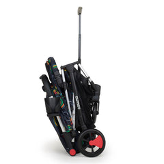 Cosatto Woosh 3 Stroller (Disco Rainbow) - side view, showing the stroller folded with its telescopic handle extended