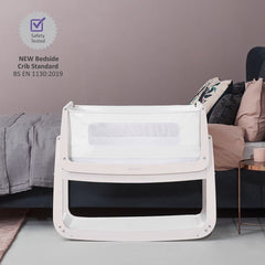SnuzPod⁴ Bedside Crib 3-in-1 (Rose White) - showing the crib`s safety testing compliance