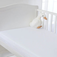 Clair De Lune Micro-Fresh® Waterproof Mattress Protector - Cot Bed (White) - lifestyle image (mattress, toy duck and furniture not included, available separately)