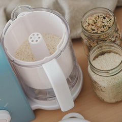 BEABA Pasta/Rice Cooker Insert -  Fits Babycook® Solo Express (White) - showing the pasta/rice insert with uncooked rice