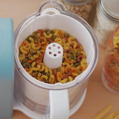 BEABA Pasta/Rice Cooker Insert -  Fits Babycook® Solo Express (White) - showing the insert with dried pasta before cooking