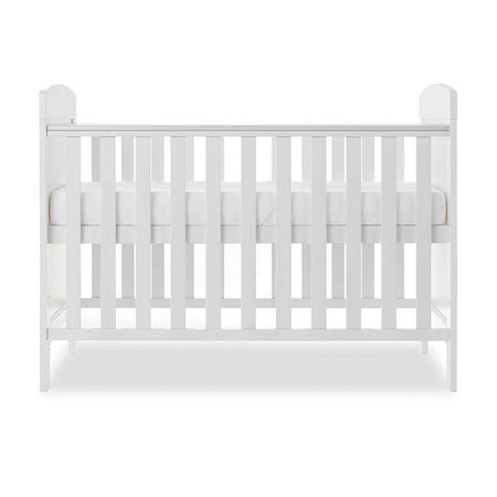 Obaby Grace Mini Cot Bed (White) - side view, shown with the mattress base at its highest level (mattress not included, available separately)
