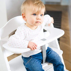 Hauck Alpha+B Wooden Highchair (White) - showing the highchair being enjoyed by an infant