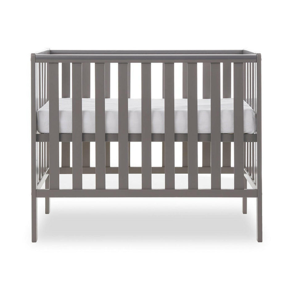 Obaby Bantam Space Saver Cot (Taupe Grey) - side view, shown with mattress base at its highest level (mattress not included, available separately)