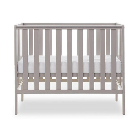 Obaby Bantam Space Saver Cot (Warm Grey) - side view, shown with mattress base at its middle level