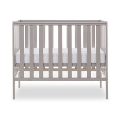 Obaby Bantam Space Saver Cot (Warm Grey) - side view, shown with mattress base at its middle level