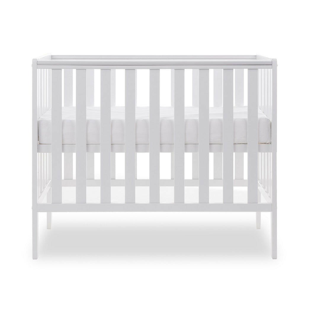 Obaby Bantam Space Saver Cot (White) - side view, shown with mattress base at its highest level (mattress not included, available separately)