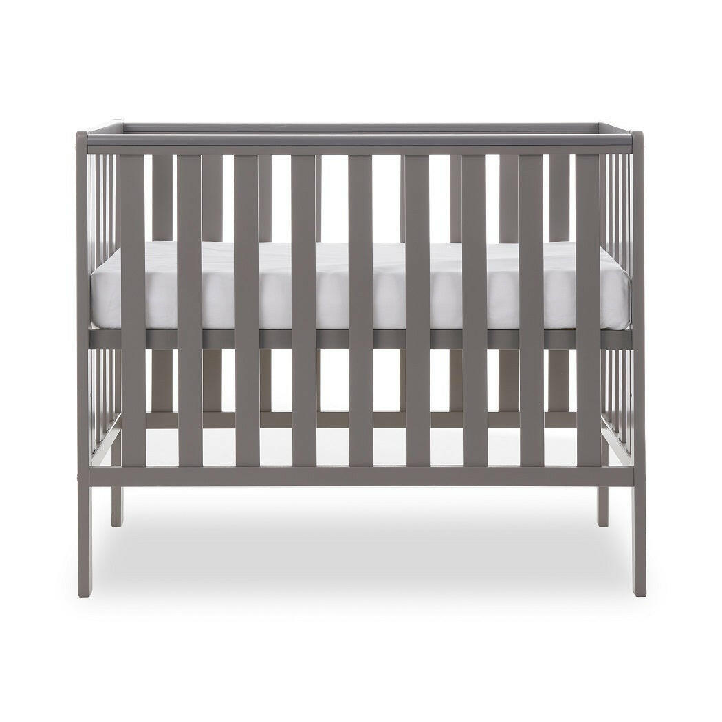 Obaby Bantam Space Saver Cot with Fibre Mattress (Taupe Grey) - side view, shown here with the mattress base at its highest level