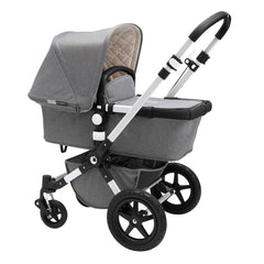 Bugaboo Cameleon 3 Plus (Grey Melange/Aluminium) - quarter view, showing the carrycot and chassis together as the pram