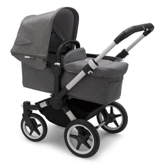 Bugaboo Donkey 3 Mono (Grey Melange/Aluminium) - quarter view, showing the carrycot and chassis together as the pram