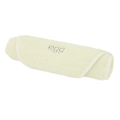 egg2 Carrycot Mattress Topper (Cream) - showing the mattress topper rolled up for storage