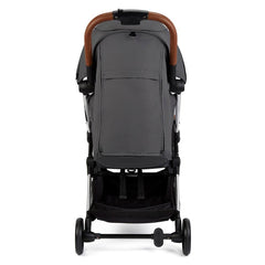 Ickle Bubba Gravity Stroller (Silver/Graphite/Tan) - showing the stroller from the rear and its tan handlebar, foot brake and shopping basket