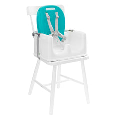 MyChild Graze 3-in-1 Highchair (Aqua) - quarter view, showing the seat unit attached to a dining chair
