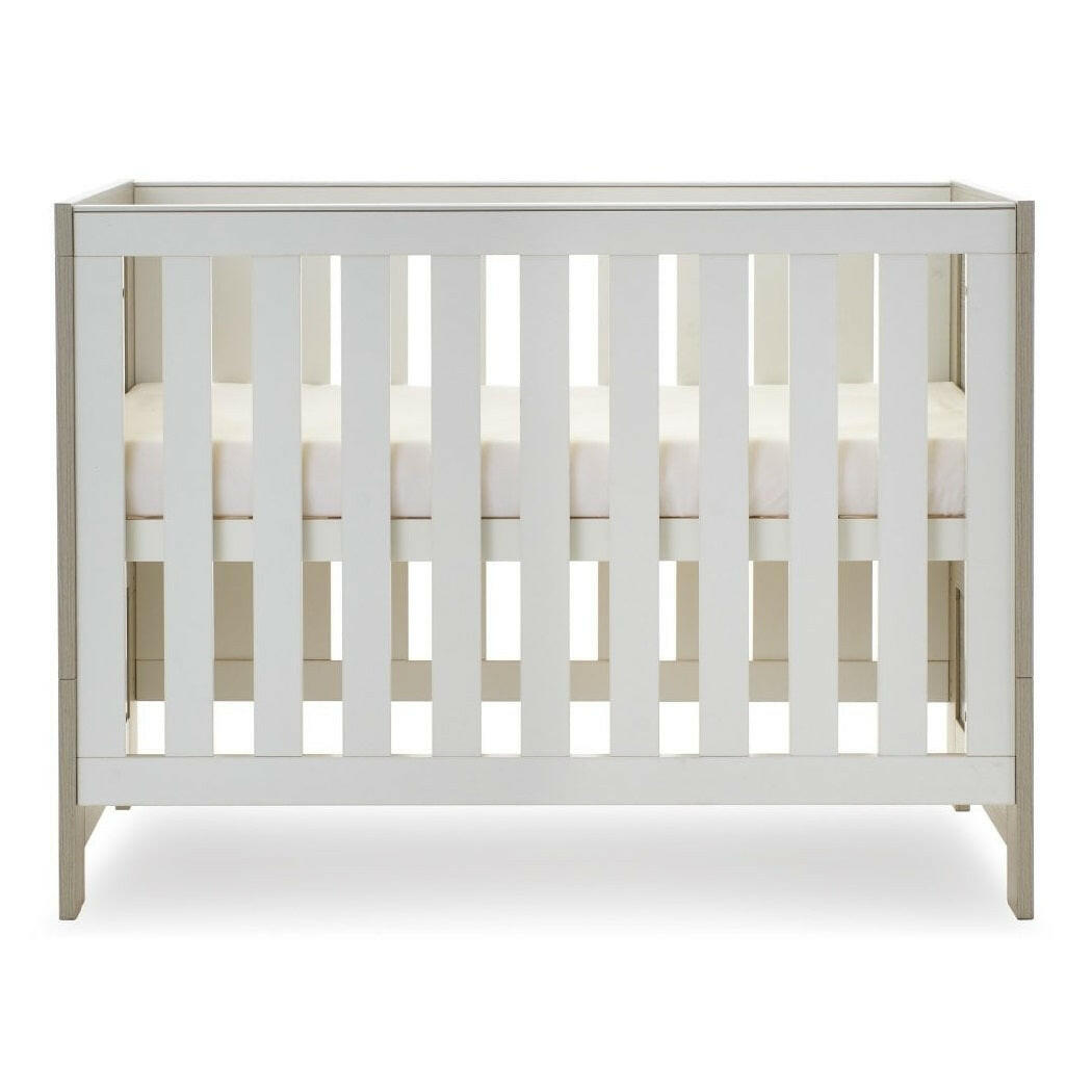 Obaby Nika Cot Bed - Grey Wash & White - with mattress base at its highest level