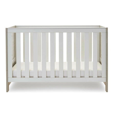 Obaby Nika Cot Bed - Grey Wash & White - side view, with mattress base at its lowest level