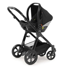 BabyStyle Oyster 3 Black ESSENTIAL Bundle - 5 Piece (Pixel) - showing the car seat fitted onto the pushchair`s chassis using the included adaptors