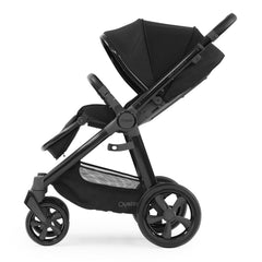 BabyStyle Oyster 3 Black ESSENTIAL Bundle (Pixel) - showing the forward-facing pushchair with the seat reclined