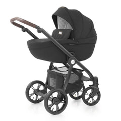 BabyStyle Prestige Nimbus ISOFIX Travel System (Black - Special Edition) - quarter view, showing the carrycot and chassis in use as the pram