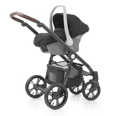 BabyStyle Prestige Nimbus ISOFIX Travel System (Nimbus Black - Special Edition) - quarter view, showing the car seat fixed onto the chassis