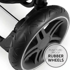 Hauck Rapid 4D Stroller (Disney - Minnie Mouse Rose) - showing one of the stroller`s large puncture-proof rubber wheels with the reflective stripe for visibility