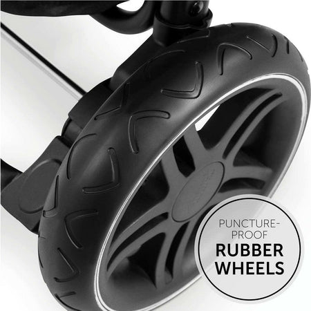 Hauck Rapid 4D Stroller (Dusty Rose) - showing one of the stroller`s large puncture-proof rubber wheels with the reflective stripe for visibility