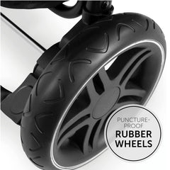Hauck Rapid 4D Stroller (Black) - showing one of the stroller`s large puncture-proof rubber wheels with the reflective stripe for visibility