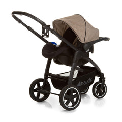 Hauck Soul Plus Trio Set (Melange Beige Almond) - showing the infant carrier fixed onto the pushchair`s chassis