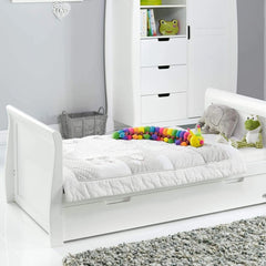 Obaby Stamford Sleigh Cot Bed with Drawer (White) - lifestyle image, shown here with the junior bed (mattress, bedding, toys and wardrobe not included, available separately)