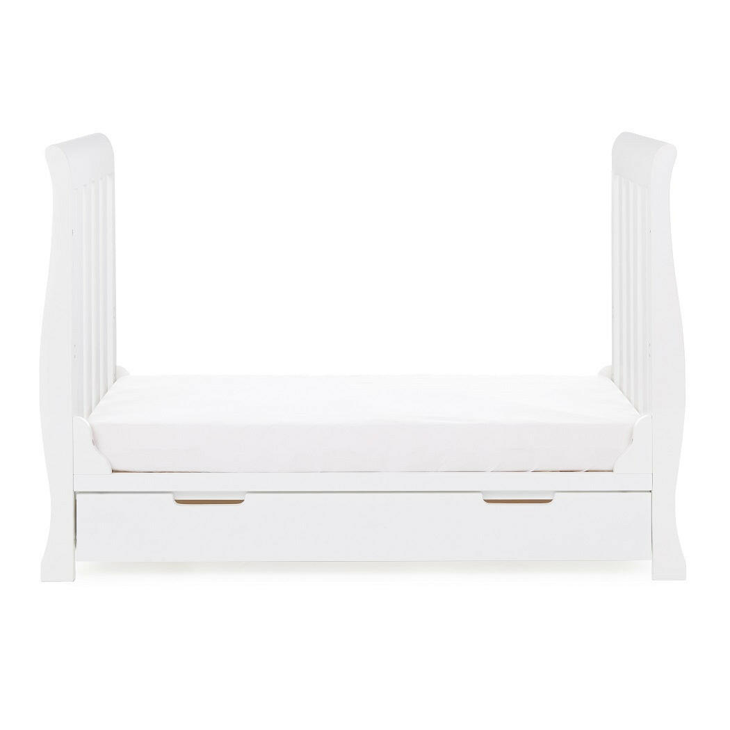 Obaby Stamford MINI Sleigh Cot Bed with Drawer (White) - side view, shown here as the junior bed (mattress not included, available separately)
