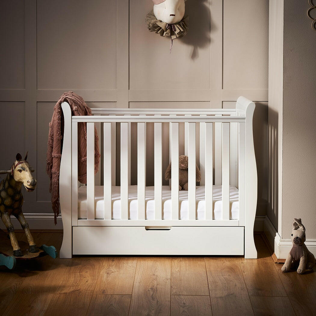 Obaby Stamford Space Saver Cot With SPRUNG Mattress (White) - lifestyle image