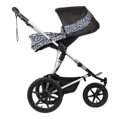 Mountain Buggy v3.2 Carrycot Plus (Graphite) - side view, shown here as the parent-facing seat fitted onto a chassis (chassis/buggy not included, available separately)