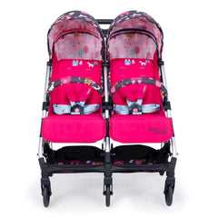 Cosatto Woosh Double Stroller (Unicorn Land) - front view, showing the bumper bars and coloured safety harnesses